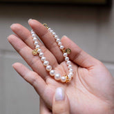 Crescendo - Smiley Gold Pearl Bracelet